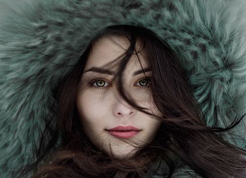 woman wearing fur hoodie
