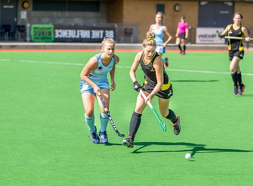 women playing outdoor sports