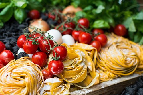 yellow pasta and cherry tomatoes