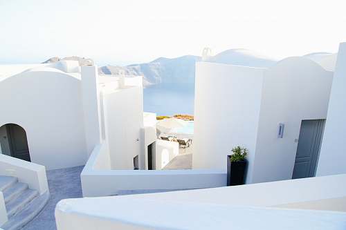 greece landscape photography of white houses interior design