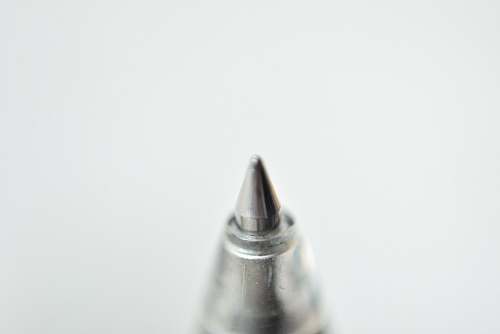 minimalist The tip of a pen. wallpaper