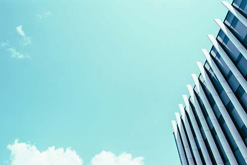 blue high rise building photography housing