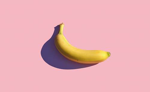 food riped banana on pink surface banana