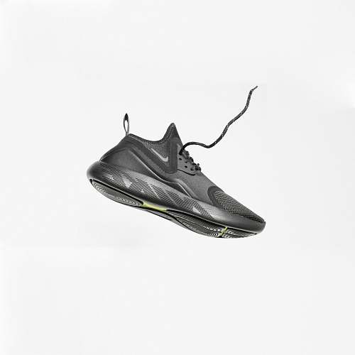 product unpaired gray Nike running shoe shoes