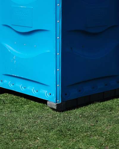 blue blue metal storage box on green grass cambridge