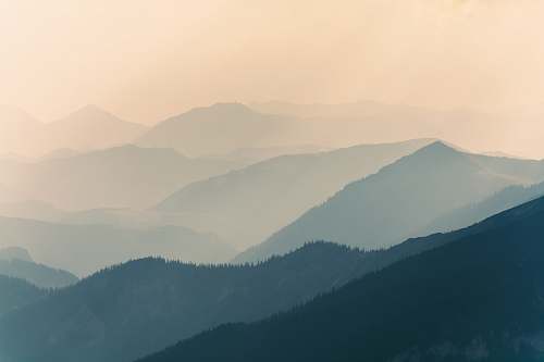 mountain aerial photograph of a mountain covered with fogs nature