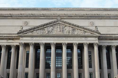 architecture grey concrete building during daytime column