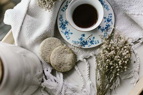 cup cup of coffee and biscuits on tray coffee cup