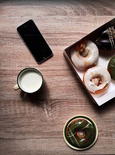 dessert turned-off space gray iPhone 5s beside mug indonesia