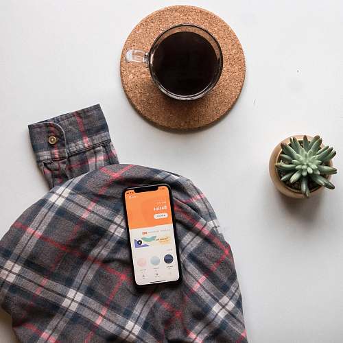 jewelry black smartphone on long-sleeved shirt brooch