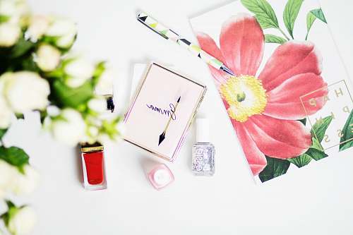 flower pink Emma box beside nail polish new york