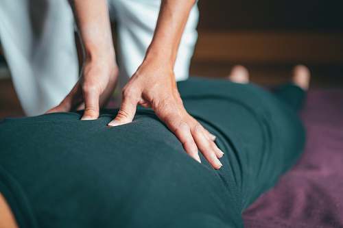 human person in white shirt and black pants patient