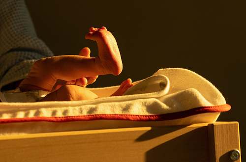 human persons feet on brown wooden table los angeles
