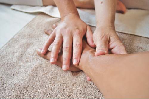 human persons hand on persons lap patient