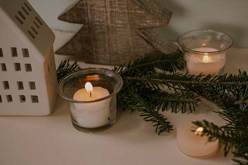 beverage clear and white votive candle milk