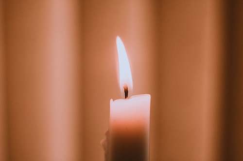fire lightened white candle flame
