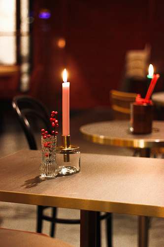 rotterdam lit candle stick on holder on table the netherlands