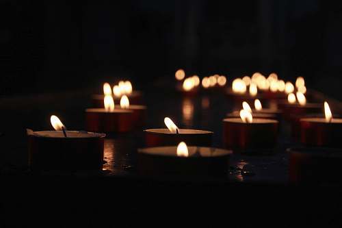 flame photo of lighted tealight candles venice
