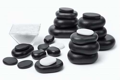 game black and gray stones on white surface pebble
