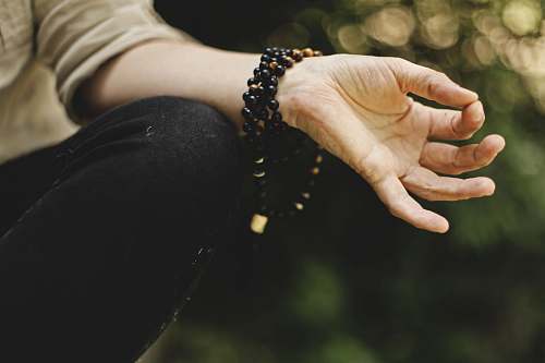person person doing meditation outdoors yoga