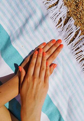 person person's hands putting on towel hand