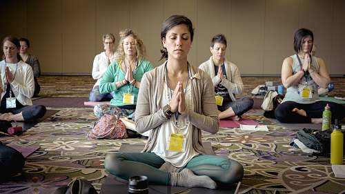 human group of people doing yoga person