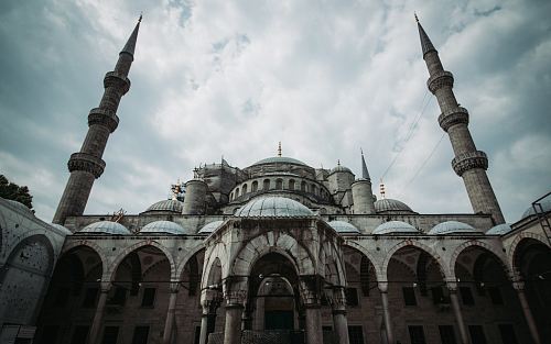 a large building with two towers