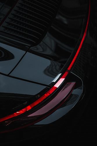 the rear end of a black car