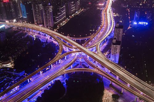 aerial photography of bridge near buildings
