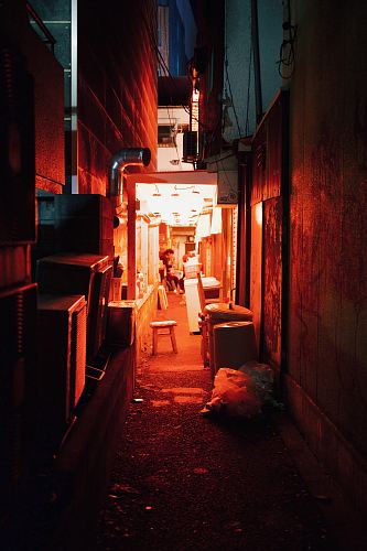 alley room with turned on light and furniture