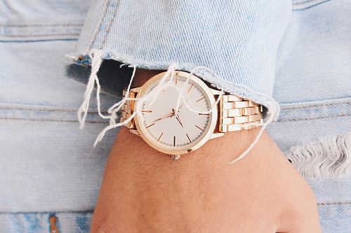 analog watch pointing at 9:45