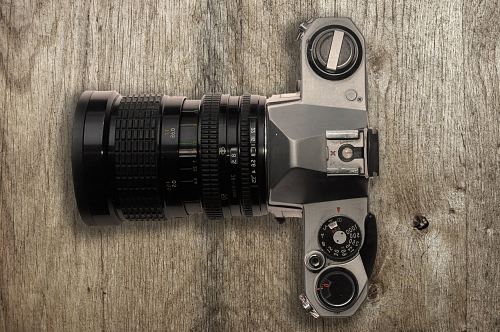 black and gray DSLR camera
