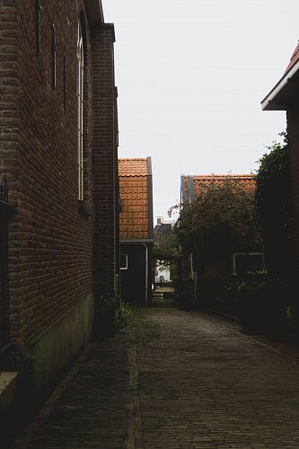 buildings and road during day
