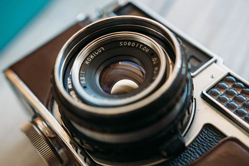 close-up photography of an old film camera