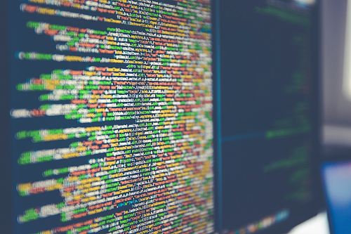Colorful software or web code on a computer monitor