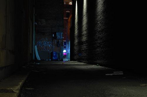 concrete pathway in between building