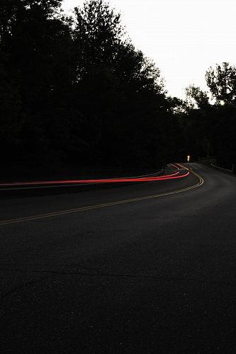 concrete road with cars passing