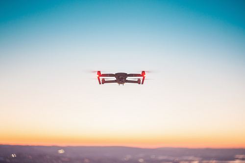 drone hoovering at daytime
