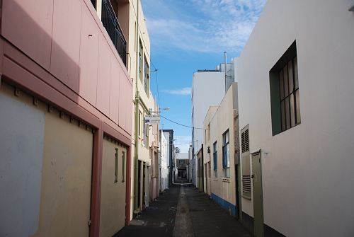 empty pathway between buildings