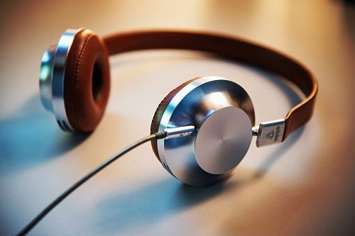 gray and brown corded headphones