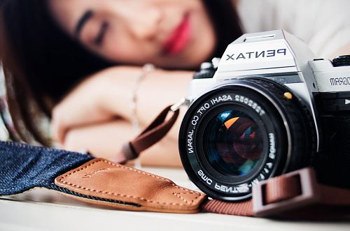gray Pentax camera selective focus photography