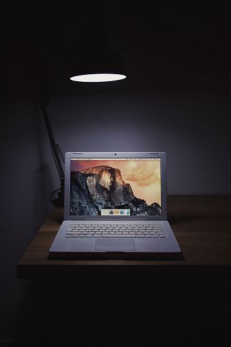 MacBook Air on wooden surface