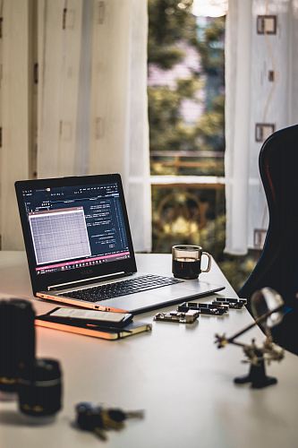MacBook Pro on white table