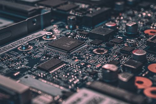 macro photography of black circuit board