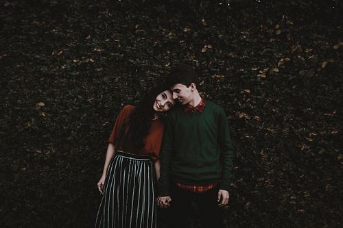 man and woman smiling each other