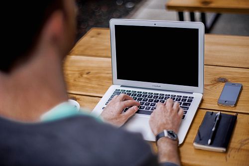 man using MacBook Air