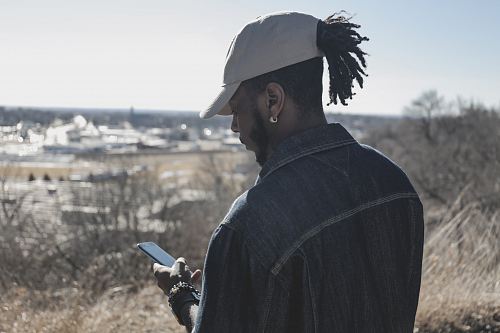 man using smartphone