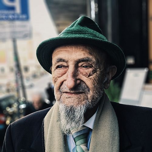 man wearing green hat during daytime