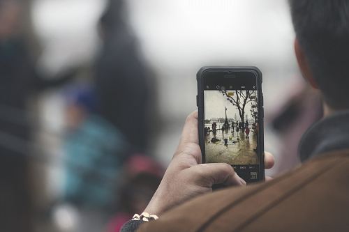 person holding black Android smartphone