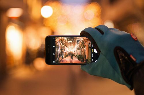 person holding black smartphone